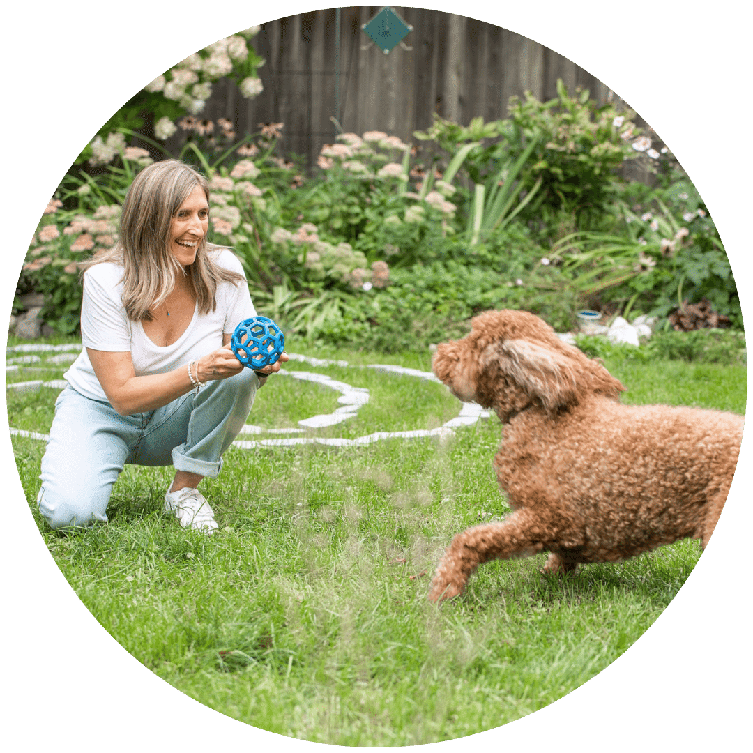 Annika playing with her dog